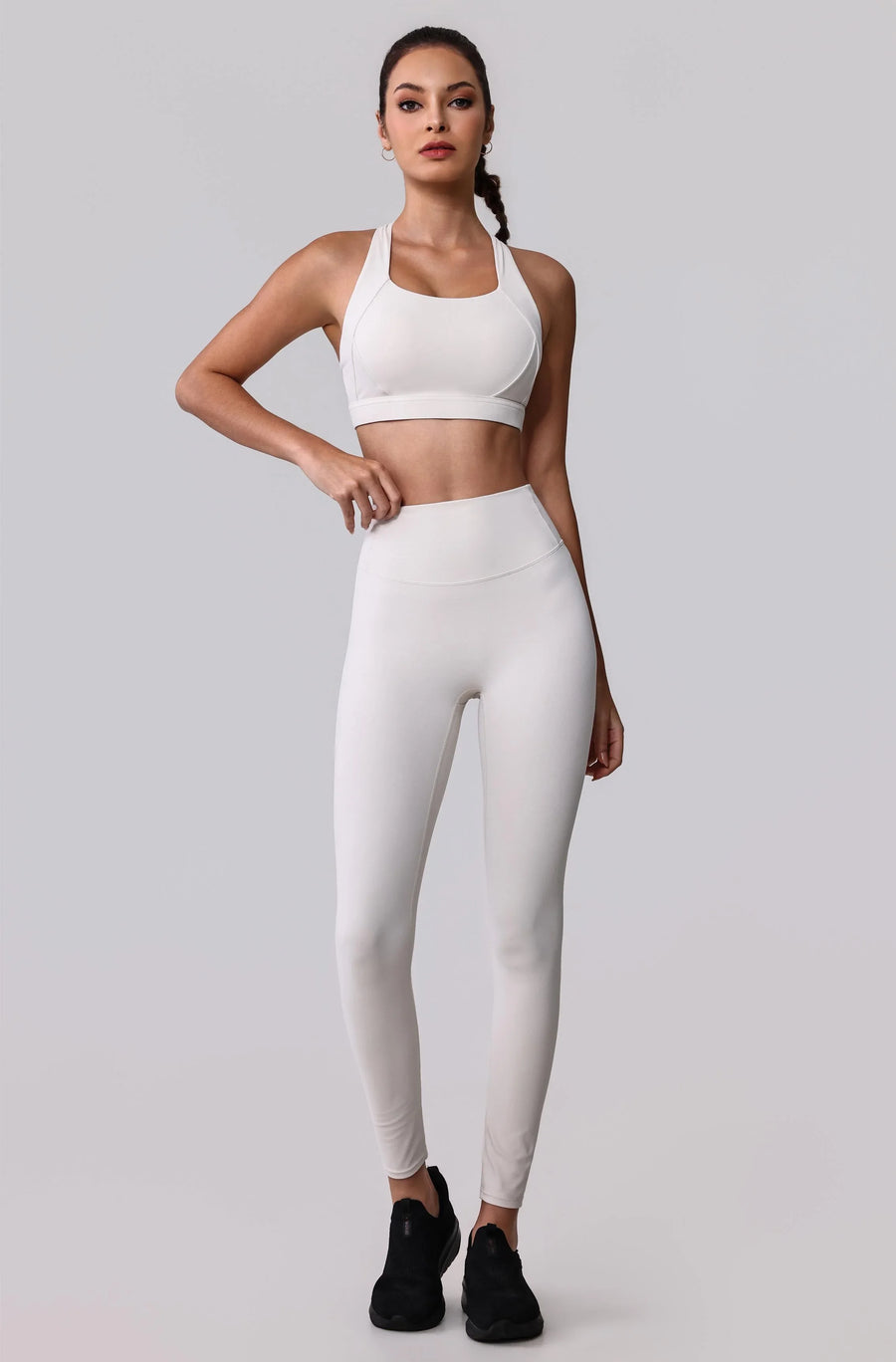 White high-waisted leggings and sports bra activewear set for gym or everyday wear
